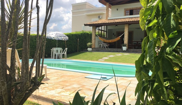 House in a gated community surrounded by nature and security.