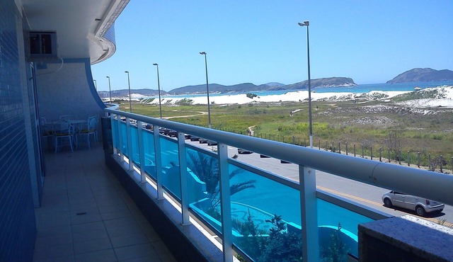 Luxurious 4-suite apartment with gourmet kitchen and large balcony overlooking the sea.