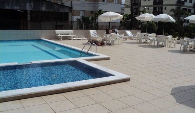 New apartment with large balcony and swimming pools. in Guarujá