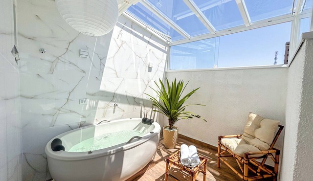 Private jacuzzi next to the subway.