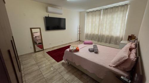 Quarto aconchegante II -c in Cruzeiro