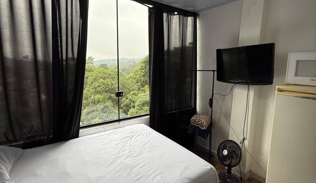 Studio apartment with forest view, 20 minutes from São Paulo city.