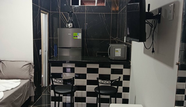 Studio apartment with bedroom, kitchen, and bathroom, comfortable and cozy, independent. in Contagem