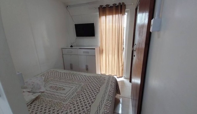 Suite with morning sun + air conditioning