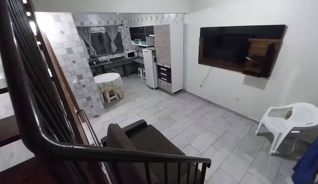 Triplex apartment with 2 bathrooms and air conditioning.