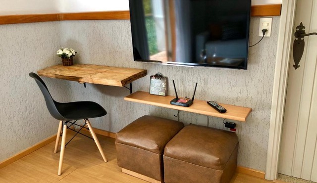 Um Loft Feliz com Natureza e Ótima Localização