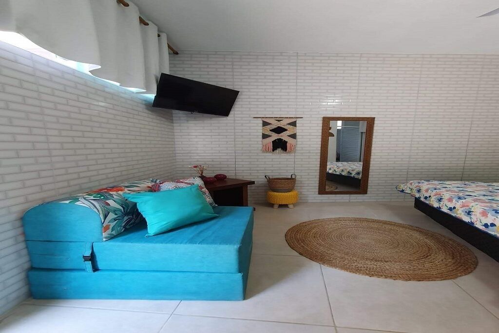 Praia da Fortaleza Condo | Next to lush nature, suite with TV, kitchen, wifi, barbecue, and garage