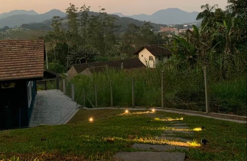 Pomerode House | Charming retreat with fireplace and nature views in Pomerode.