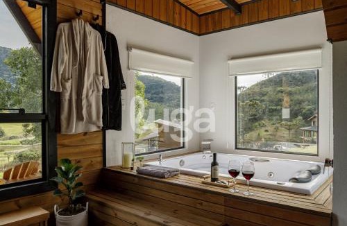 Bom Retiro Ski Chalet | Retreat of the Spring: Chalet, Sauna, and Hot Tub in the Mountains
