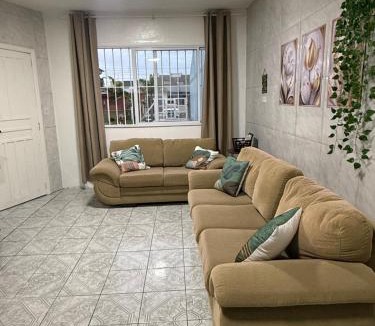 Centro House | Casa no Centro de Imbé com Estacionamento e Pátio