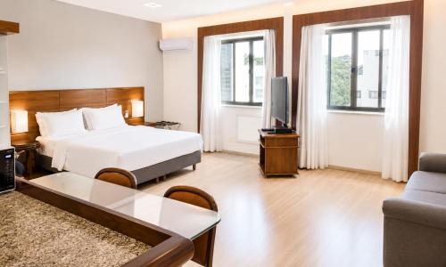 Atiradores Hotel | Suíte moderna e confortável no centro | Sauna & Garagem
