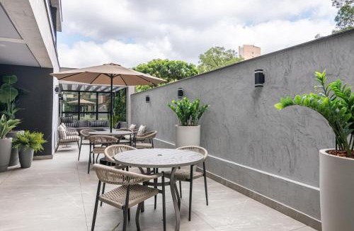 Agua Verde Apartment | Varanda panorâmica | Suíte Comfort Batel
