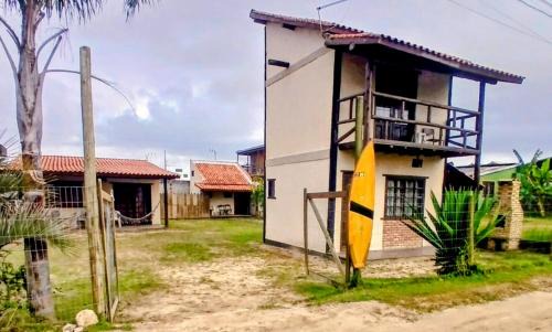 Ibiraquera House | ICE POINT SURF HOUSES Praia do Rosa- Necessário Pré-pagamento Metade Valor Total