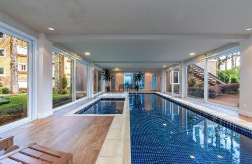 Carniel Apartment | Apto Impecável com piscina aquecida e jacuzzi