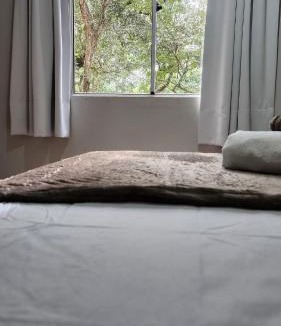 Afonso Pena Apartment | 2-bedroom apartment 9 min from the airport, garage and Wi-Fi