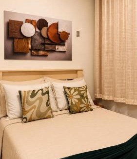 Gonzaga Apartment | Praia do Gonzaga, 5 hóspedes, 2 Quartos, Ar Condicionado, Pé na Areia