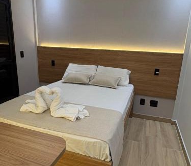 Portal da Serra Apartment | Suite Conceito Reformada com Cozinha Planejada, Iluminacao Cenica e Piscina Resort em Serra Negra