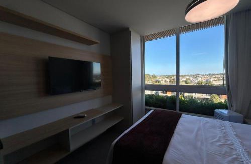 Xangri-La Apartment | Sol, Conforto e Piscina Térmica no Livin LOFT - 611 T3