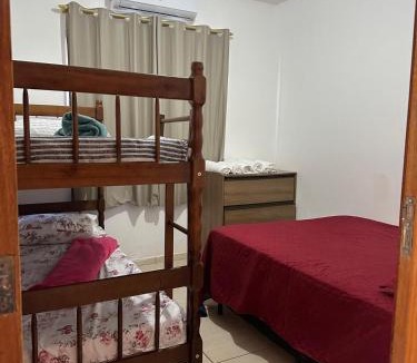 Muquem Apartment | Ground floor apartment with air conditioning and barbecue area near the beaches