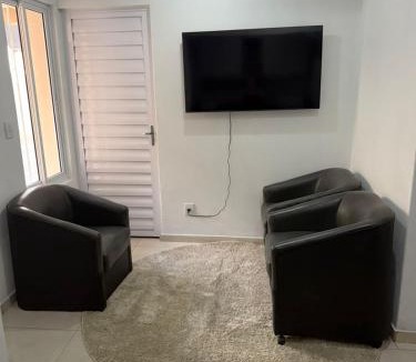 Tramandai Apartment | Apartamento térreo no Centro de Tramandaí, com ar condicionado, garagem e churrasqueira
