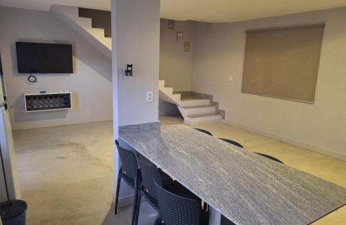 Manguinhos House | Casa na praia prática aconchegante
