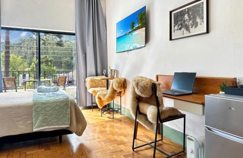 Abernessia House | Pousada em Campos - WiFi Rápido - Varanda - Home Office