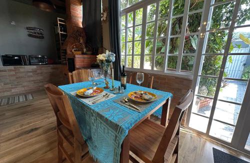 Nacoes House | Arthi - LINDO LOFT RECANTO DOS PASSARINHOS