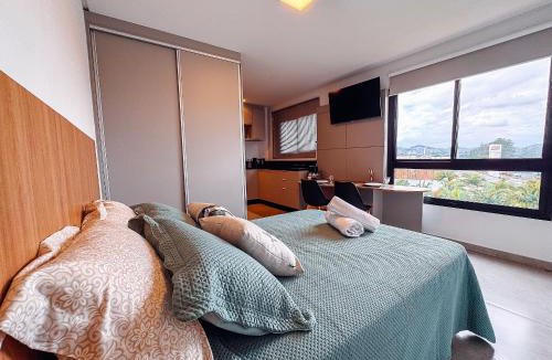 Santa Terezinha Apartment | Studio Moderno c/Piscina e Garagem