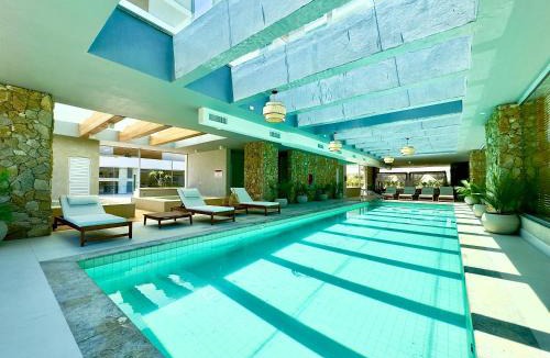 Picarras Apartment | Apartamento em Condomínio Frente-Mar com Piscinas, Jacuzzi Aquecida, Sauna, Academia, Brinquedoteca, Churrasqueira na Sacada, Cozinha Completa e Lazer de Home Club