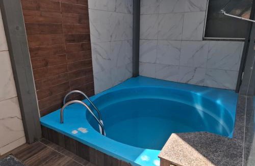 Morretes Apartment | Apto Térreo Privativo com Piscina Ar condicionado e vaga de estacionamento em Itapema