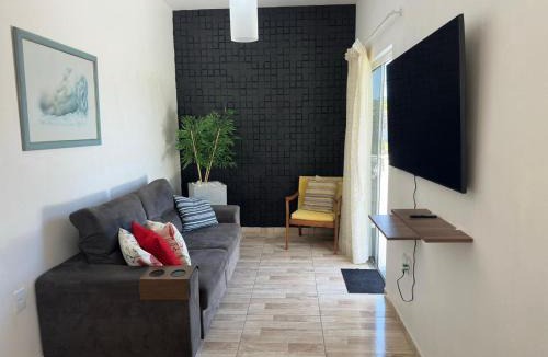 Canasvieiras House | Casa em Florianópolis no bairro de Canasvieiras com sacada e churrasqueira!