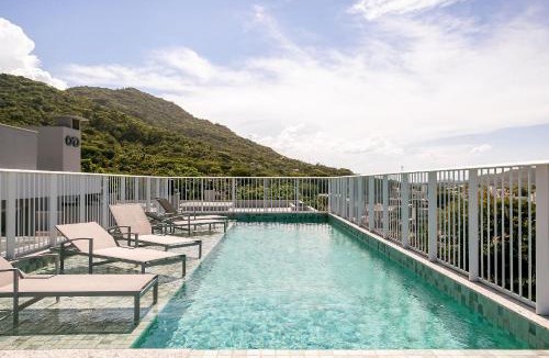 Alto Ribeirao Leste Apartment | With a beautiful view and a pool near the beaches and airport