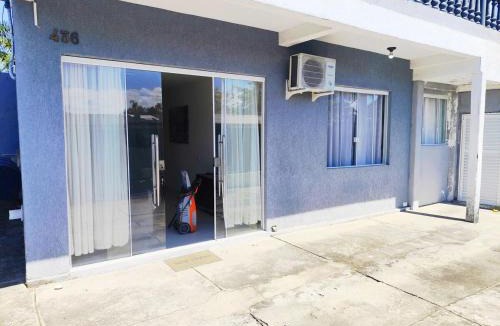 Praia de Leste House | House in Downtown East Beach with Air Conditioning