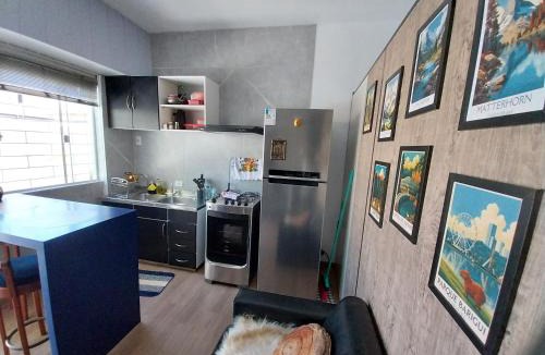 Novo Mundo House | Casa Studio térreo com vaga de garagem