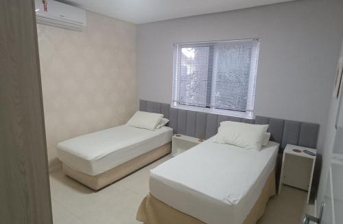 Avenida Apartment | Apartamento térreo aconchegante com estacionamento na porta