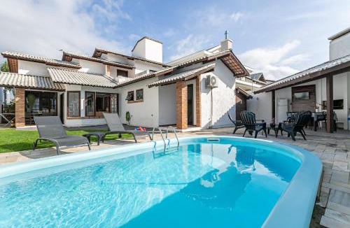 Jurere Internacional House | Casa Aconchego Jurerê Internacional,6 quartos , churrasqueira, piscina, 350m do mar