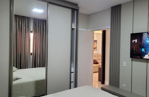 Bombas Apartment | Apartamento 2 suítes, piscina aquecida condomínio, alto padrão, 1 quadra mar, familiar
