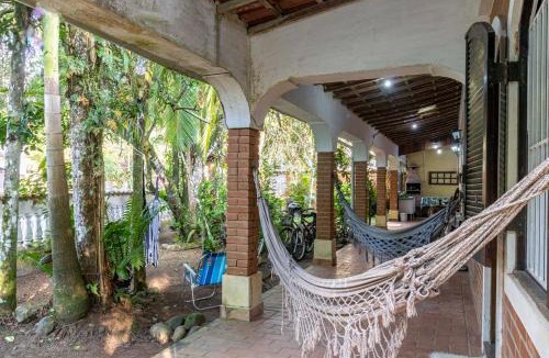 Guarau House | Casa rustica com Wi-Fi, garagem e aceita pet