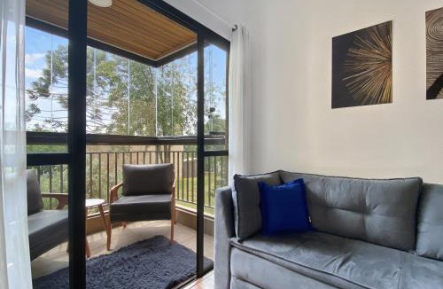 Campos do Jordao Apartment | Lareira - Varanda - Cozinha - Estacionamento