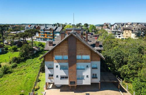 Dutra Apartment | Conforto a 500m do Super Carros by Achei Gramado