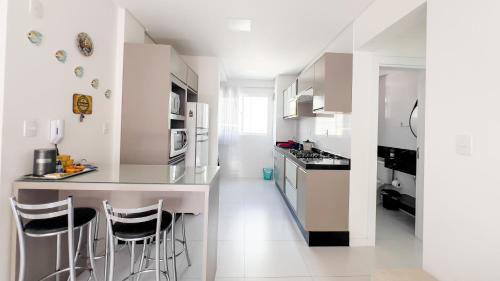 Andorinha Apartment | Apartamento 2 dormitórios a 300 metros do mar na Meia Praia - Itapema-sc