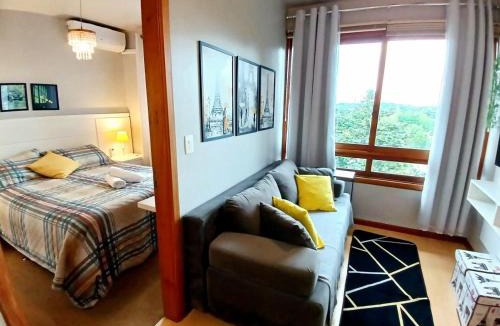 Bairro Lago Negro Apartment | Follow Gramado - Apartment, walk everywhere! View! Smart TV! Air conditioning!