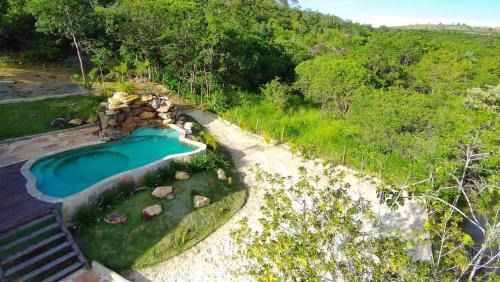Jaboticatubas House | Chalé com hidromassagem e piscina com cascata natural defronte Lagoa Lagoa na Serra do Cipó