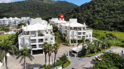 Ingleses do Rio Vermelho Apartment | Villa Giardino - Condomínio de Frente para o Mar - Piscina, Quadra Esportiva, Churrasqueira - 5 Pessoas