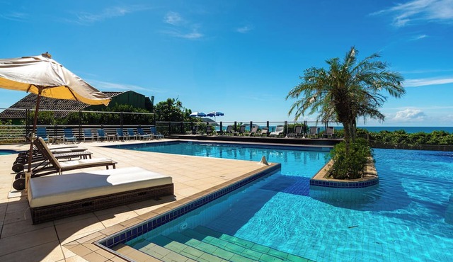 Your luxurious beachfront retreat in Santinho: 2 suites for 4 people, swimming pools.