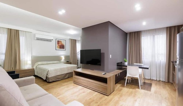Le Village Flats e Hotel