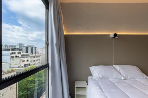 Studio Acolhedor com Projetor, Ar Condicionado e Localização Imbatível