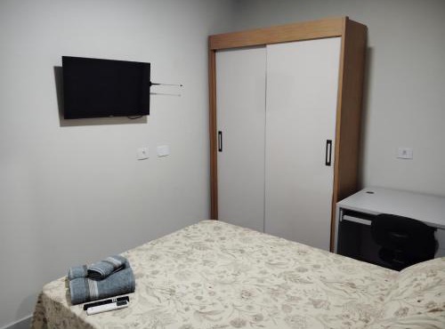 Apartamento compacto de 1 quarto com suíte