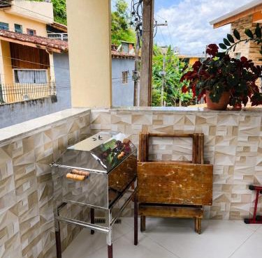 Casa com Ar Condicionado e Churrasqueira a 800m da Praia in São Sebastião