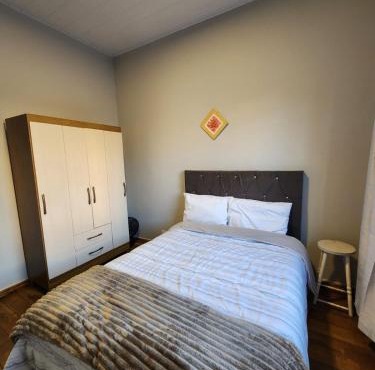 Pequeno quarto no coração de Curitiba